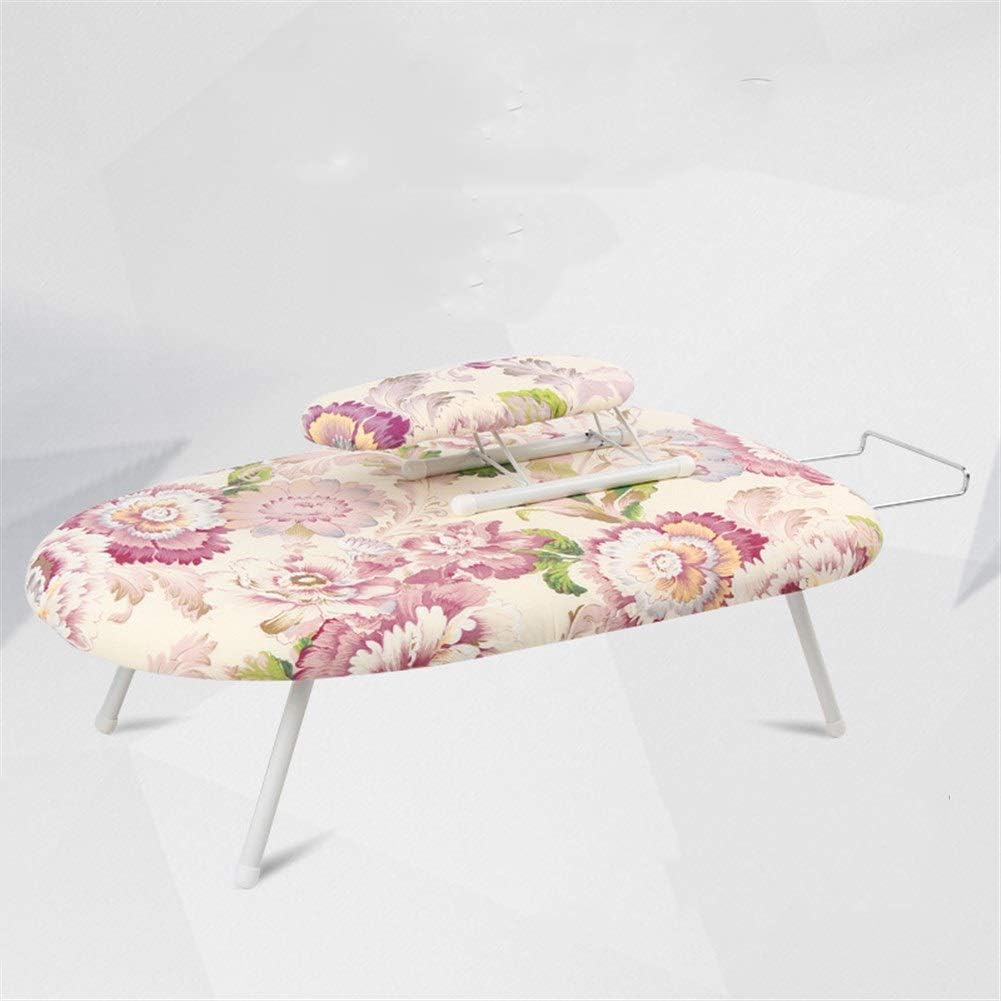 La planche de table comporte une surface laissant passer la vapeur ij2822799